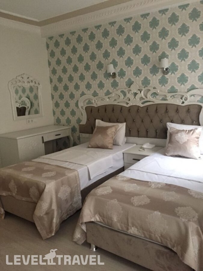 фотографии номера Трехместный экономичный отеля Deluxe Newport Hotel в Турция(Фатих) - фото №1