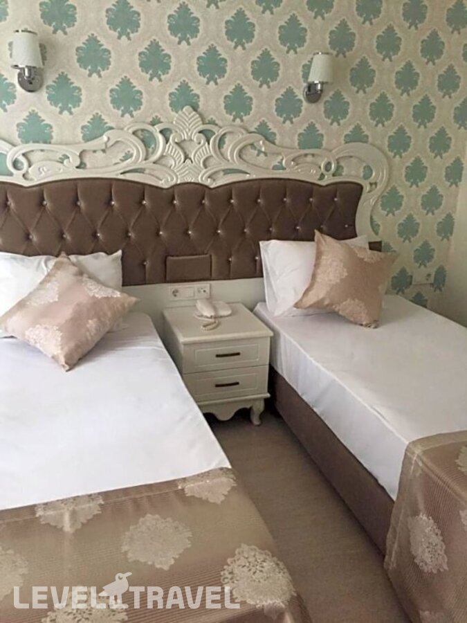 фотографии номера Трехместный экономичный отеля Deluxe Newport Hotel в Турция(Фатих) - фото №10