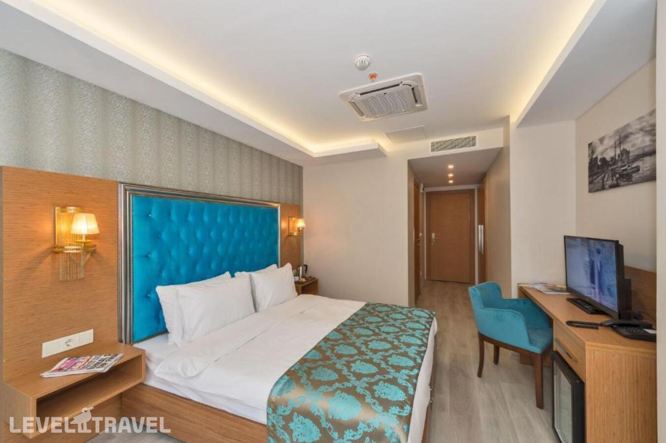 фотографии номера Делюкс (две односпальные кровати) отеля Grand Palace Hotel в Турция(Бахчелиэвлер) - фото №14