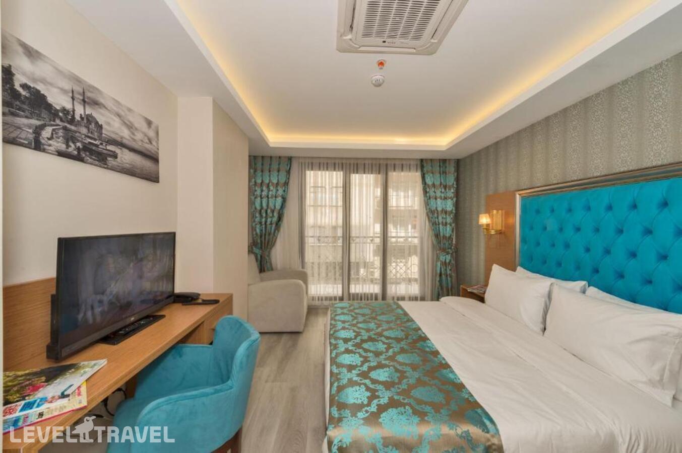 фотографии номера Делюкс (две односпальные кровати) отеля Grand Palace Hotel в Турция(Бахчелиэвлер) - фото №13