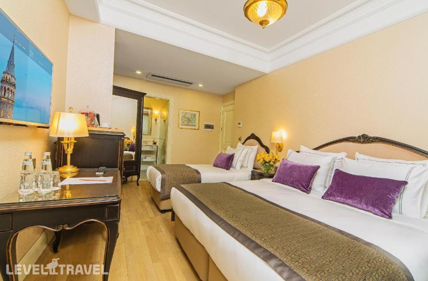 фотографии номера Трехместный делюкс отеля Meroddi Bagdatliyan Hotel в Турция(Бейоглу) - фото №3