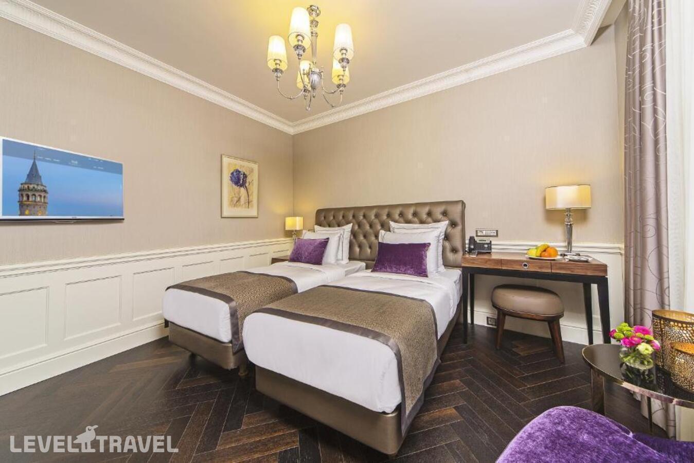фотографии номера Делюкс (две односпальные кровати) отеля Meroddi Bagdatliyan Hotel в Турция(Бейоглу) - фото №1