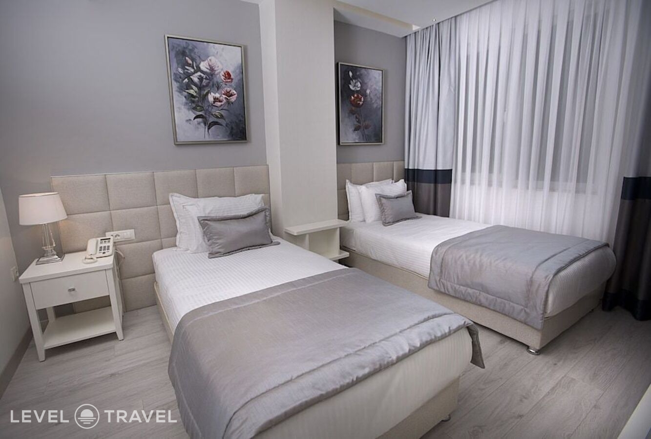 фотографии номера Делюкс (две односпальные кровати) отеля Rawda Hotel Bakirkoy в Турция(Бакыркёй) - фото №2