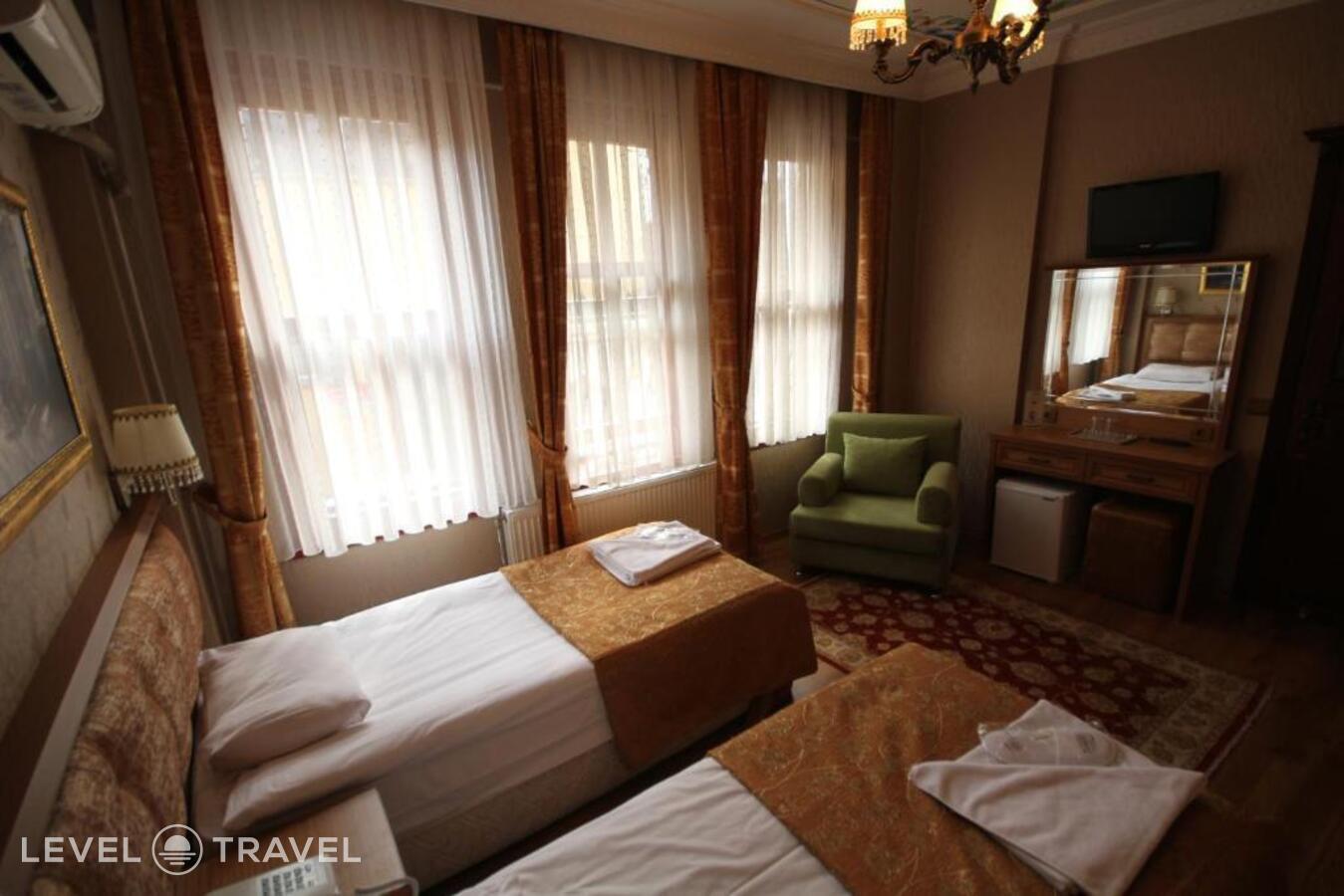 фотографии номера Стандартный (две односпальные кровати) отеля Tashkonak Hotel Istanbul в Турция(Фатих) - фото №2