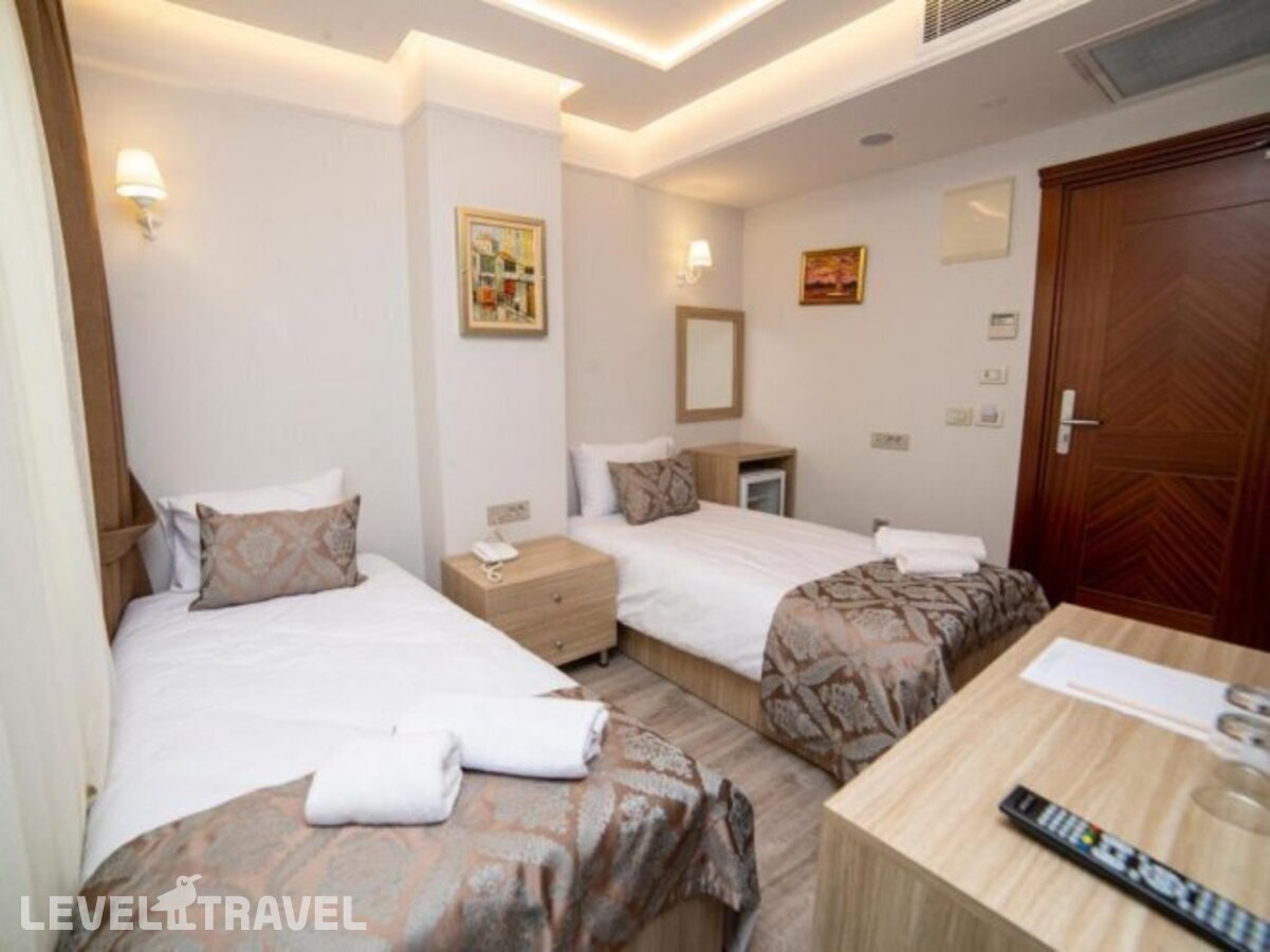 фотографии номера Стандартный (две односпальные кровати) отеля Hhk Hotel Downtown в Турция(Султанахмет) - фото №3