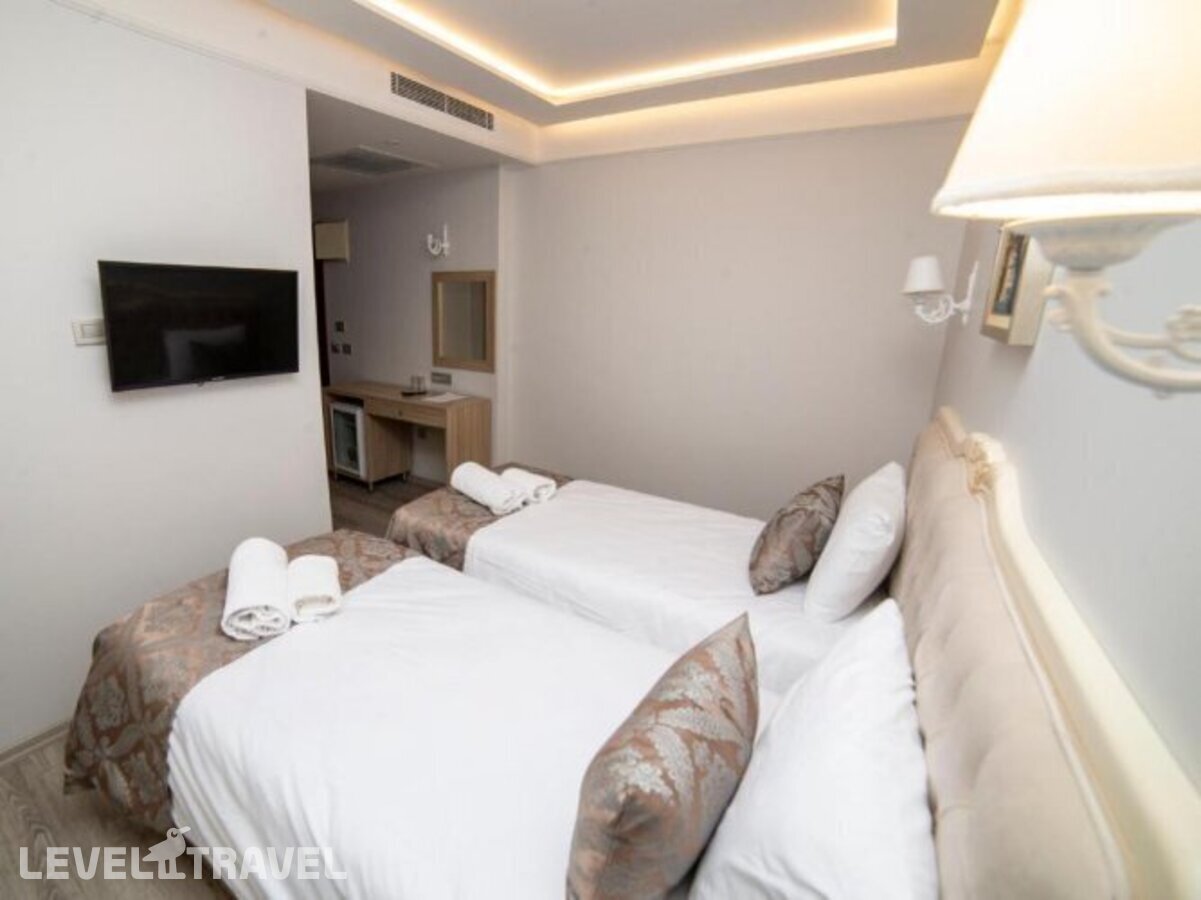 фотографии номера Стандартный (две односпальные кровати) отеля Hhk Hotel Downtown в Турция(Султанахмет) - фото №5