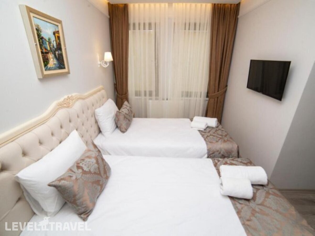 фотографии номера Стандартный (две односпальные кровати) отеля Hhk Hotel Downtown в Турция(Султанахмет) - фото №15