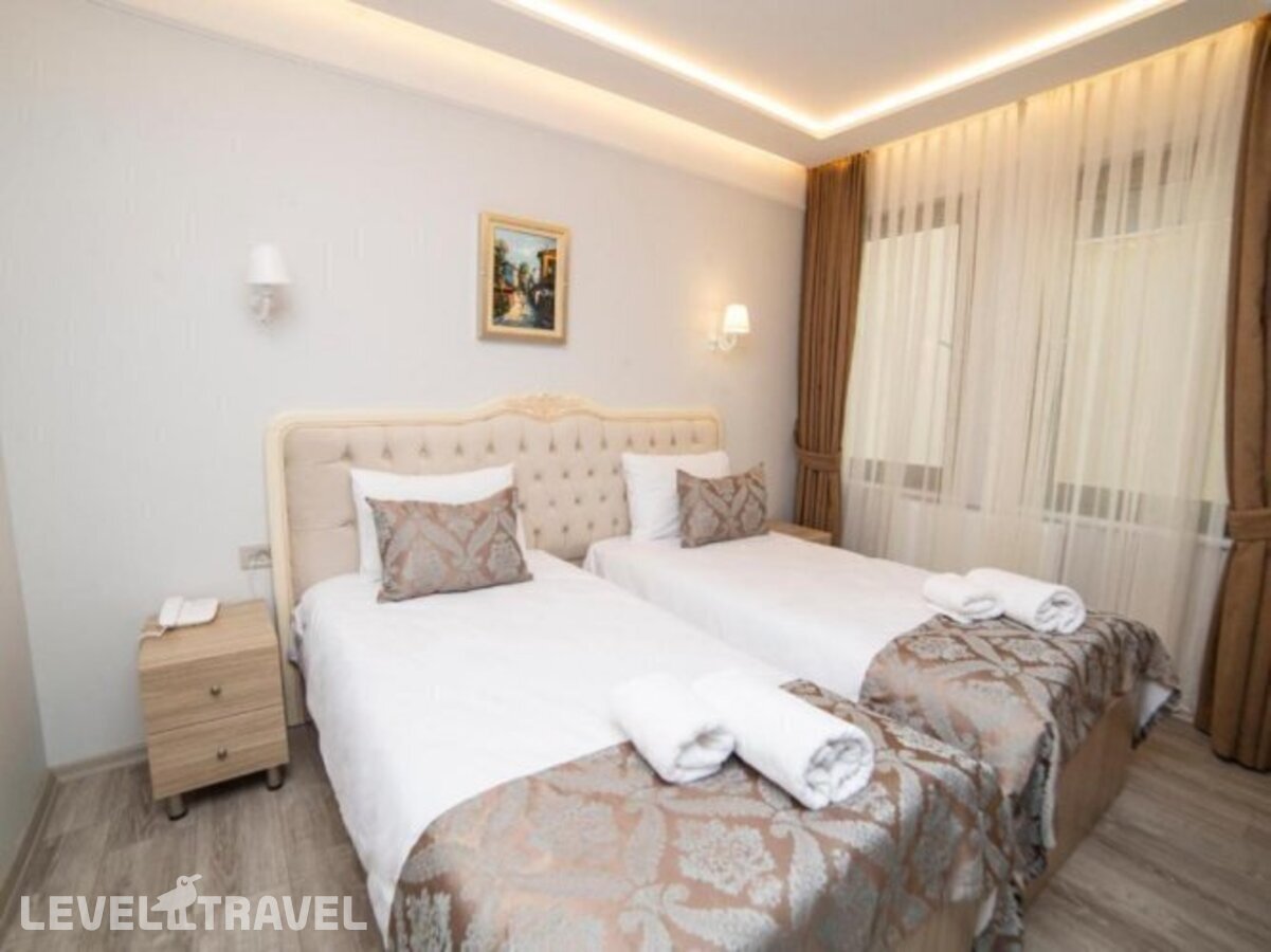 фотографии номера Стандартный (две односпальные кровати) отеля Hhk Hotel Downtown в Турция(Султанахмет) - фото №1