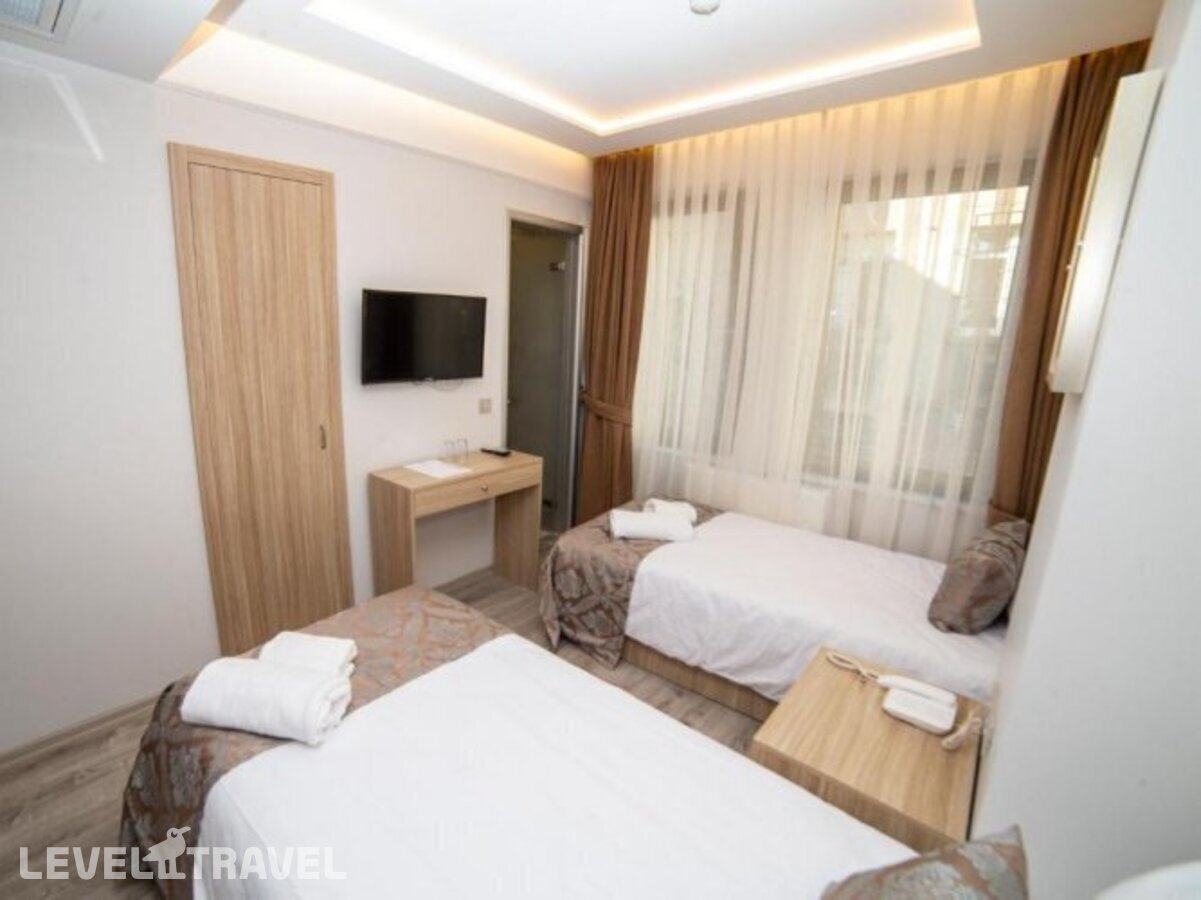 фотографии номера Стандартный (две односпальные кровати) отеля Hhk Hotel Downtown в Турция(Султанахмет) - фото №12