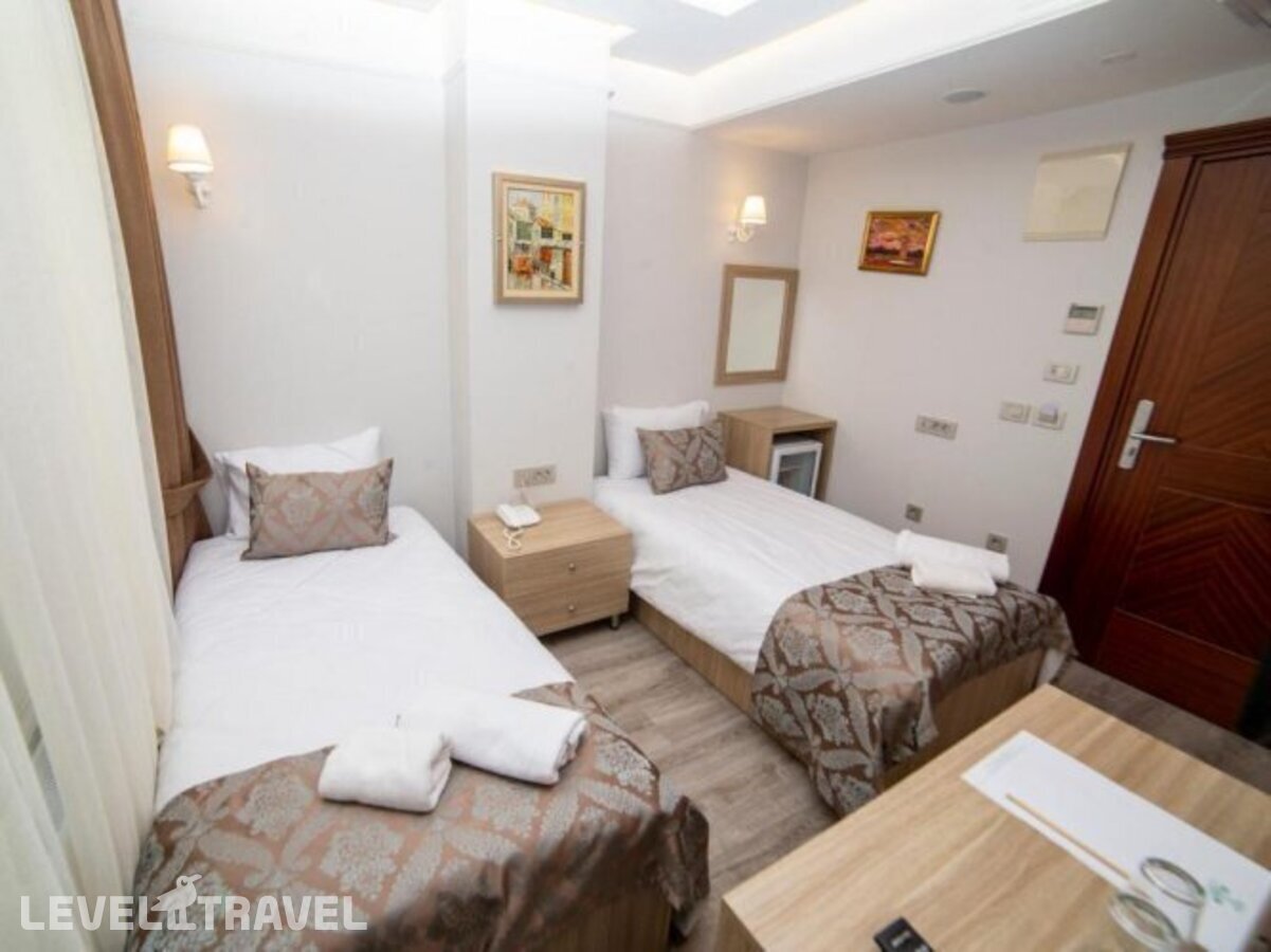 фотографии номера Стандартный (две односпальные кровати) отеля Hhk Hotel Downtown в Турция(Султанахмет) - фото №2