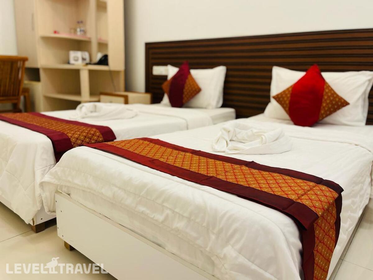 фотографии номера Стандартный (две односпальные кровати) отеля Dream Relax Inn в Мальдивы(Мале) - фото №1