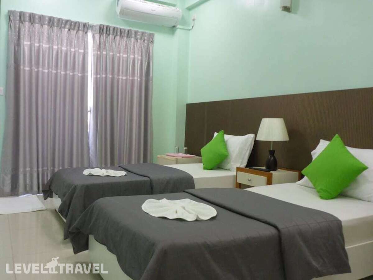 фотографии номера Стандартный (две односпальные кровати) отеля Dream Relax Inn в Мальдивы(Мале) - фото №4