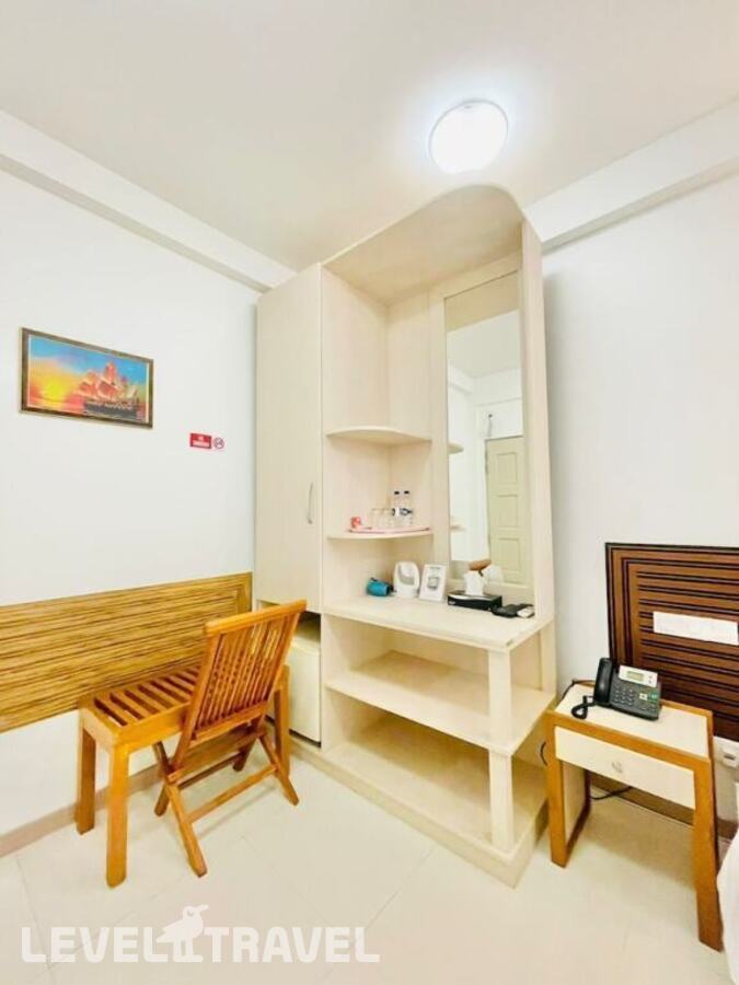 фотографии номера Стандартный (две односпальные кровати) отеля Dream Relax Inn в Мальдивы(Мале) - фото №5