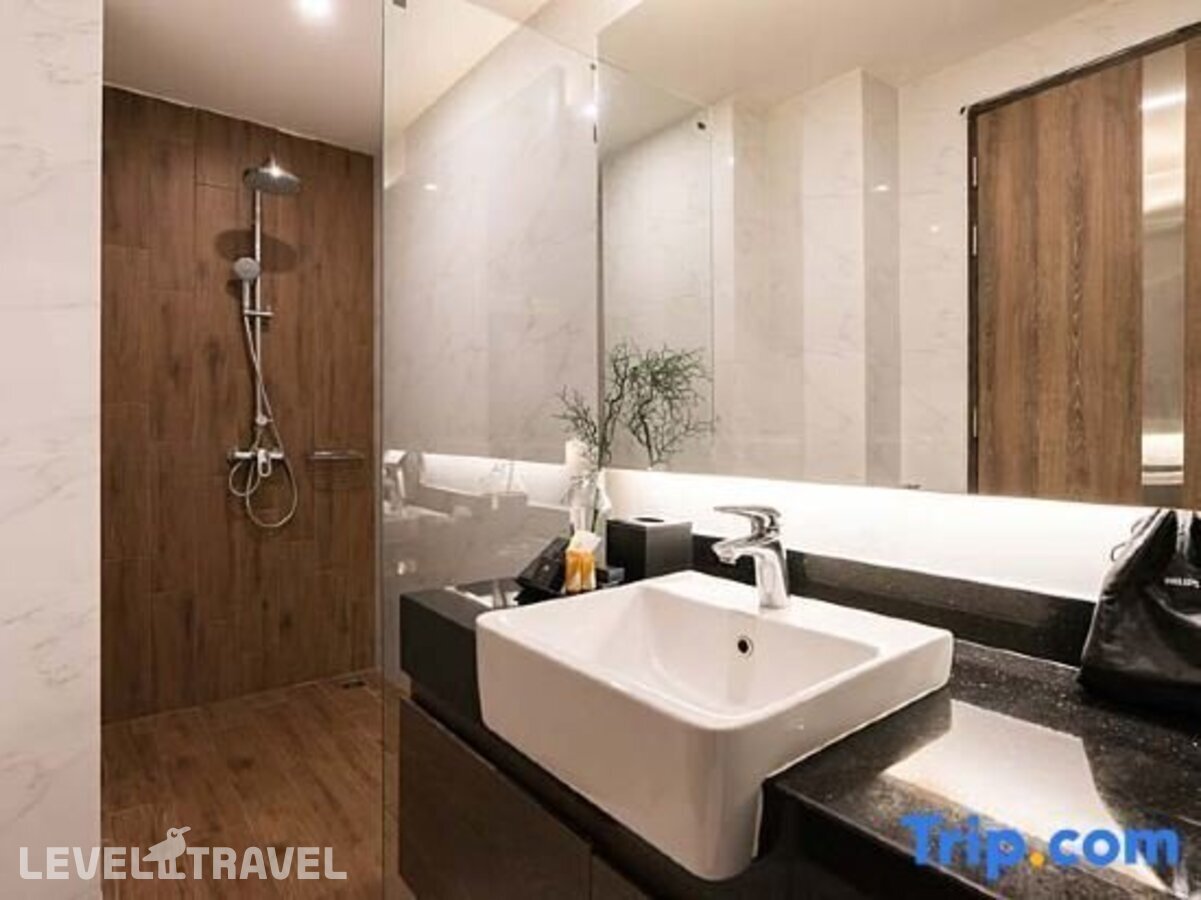 фотографии номера Улучшенный (две односпальные кровати) отеля Acqua Hotel Pattaya в Таиланд(Центральная Паттайя) - фото №3