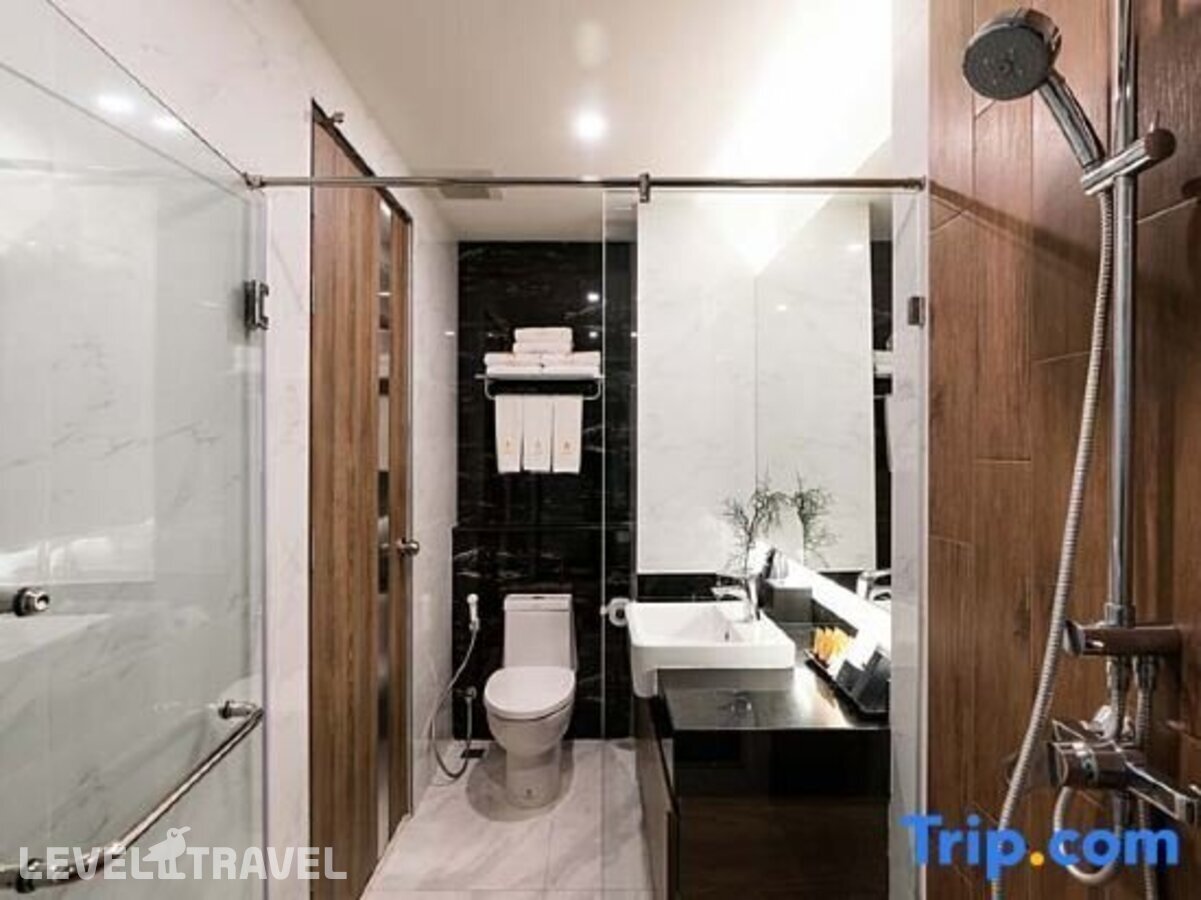 фотографии номера Улучшенный (две односпальные кровати) отеля Acqua Hotel Pattaya в Таиланд(Центральная Паттайя) - фото №2