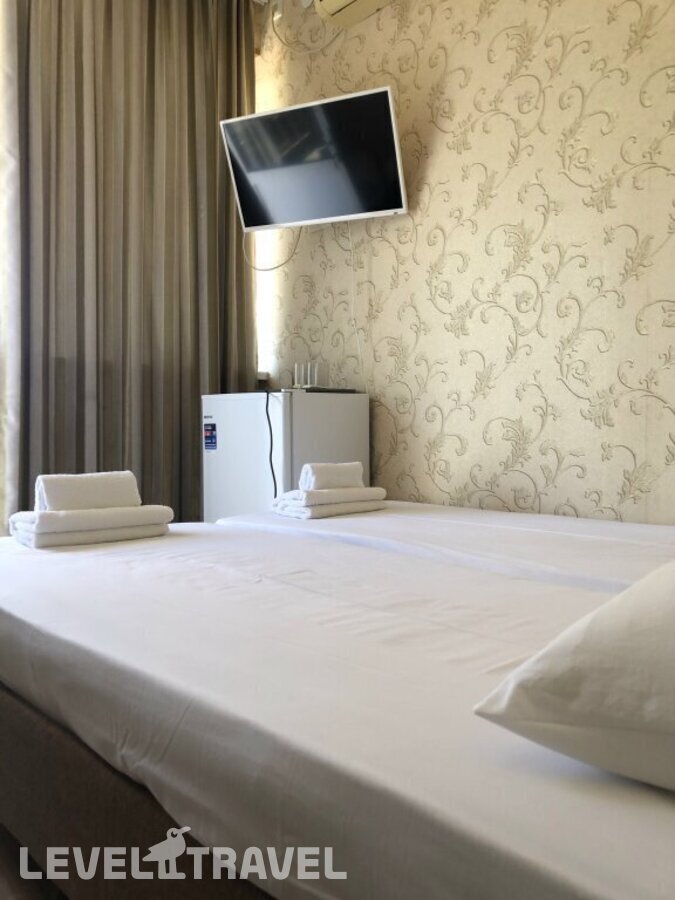 фотографии номера Стандартный с балконом (две односпальные кровати) отеля Rich Hotel в Россия(Адлер) - фото №3