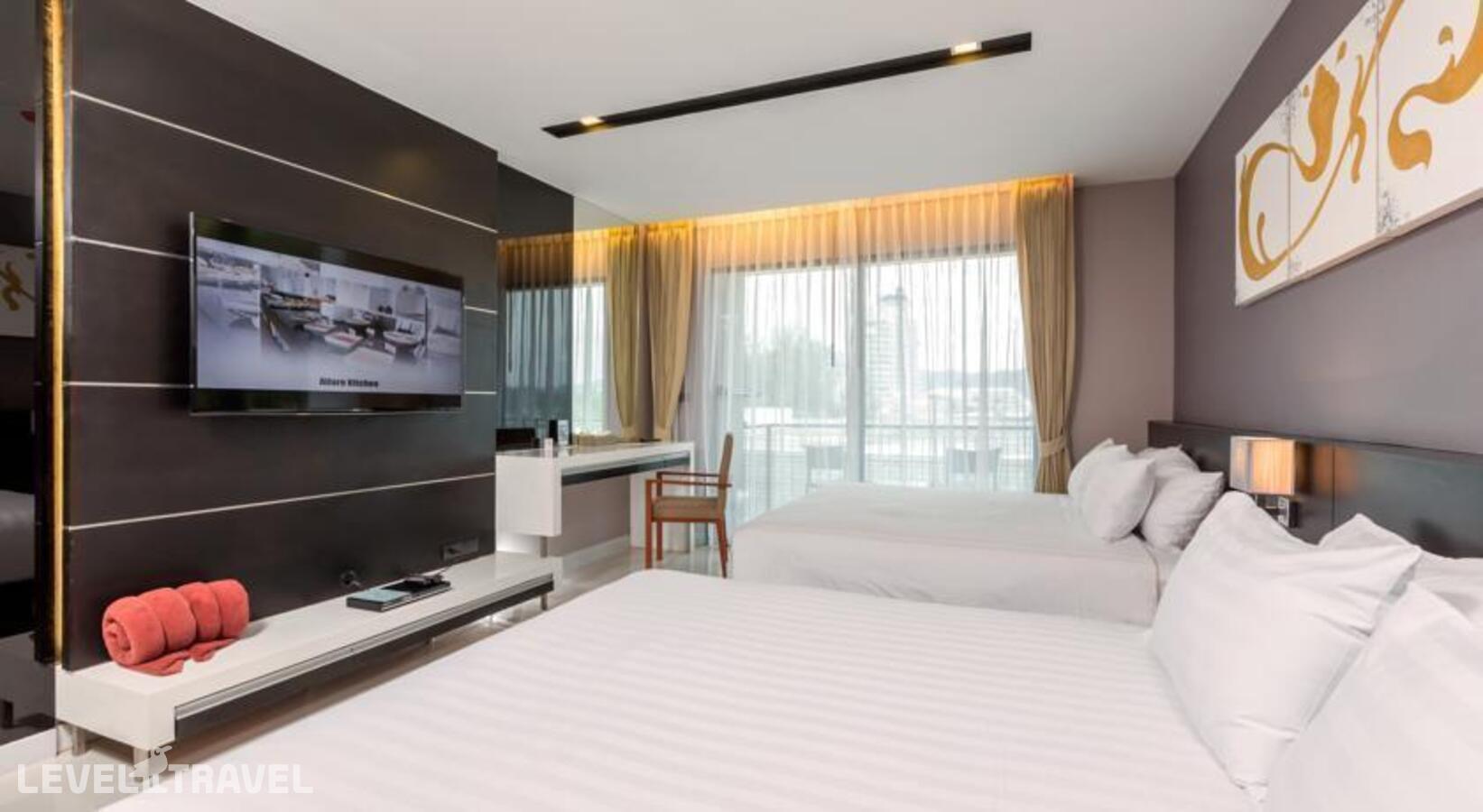 фотографии номера Семейный люкс (1 спальня) отеля The Charm Resort Phuket в Таиланд(Патонг Бич) - фото №4