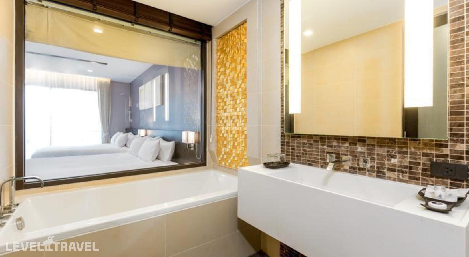 фотографии номера Семейный люкс (1 спальня) отеля The Charm Resort Phuket в Таиланд(Патонг Бич) - фото №5