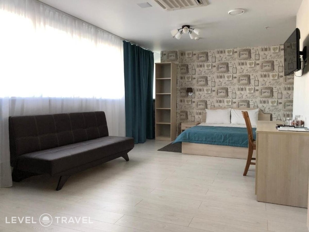 фотографии номера Семейный полулюкс (двуспальная кровать) отеля New City Inn в Россия(Центральный административный округ (ЦАО)) - фото №1