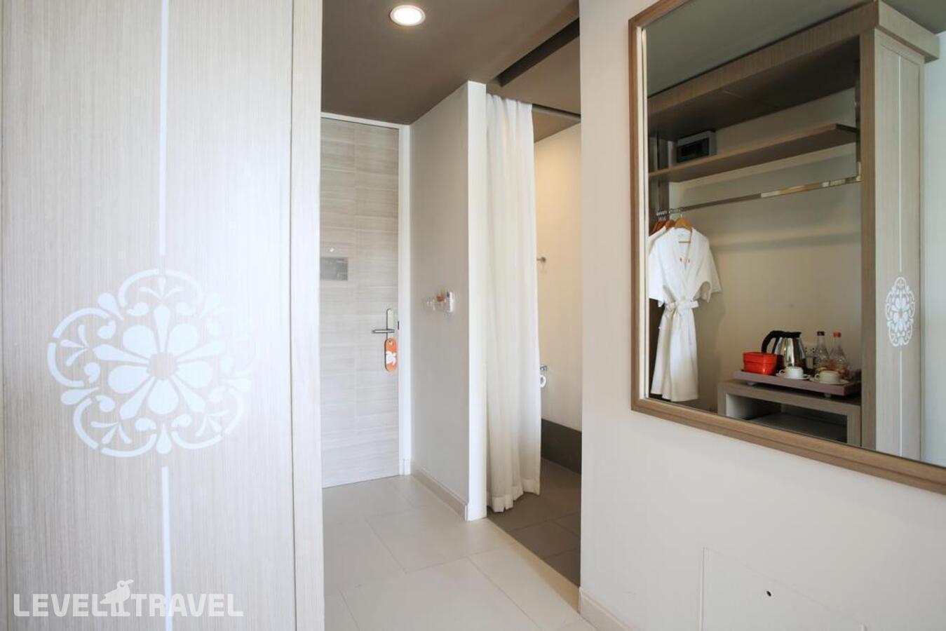 фотографии номера Улучшенный с выходом к бассейну отеля Proud Phuket Hotel в Таиланд(Най Янг Бич) - фото №4