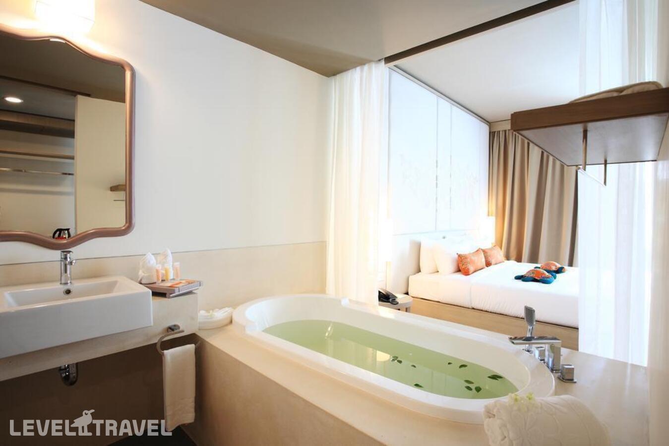 фотографии номера Улучшенный с выходом к бассейну отеля Proud Phuket Hotel в Таиланд(Най Янг Бич) - фото №2