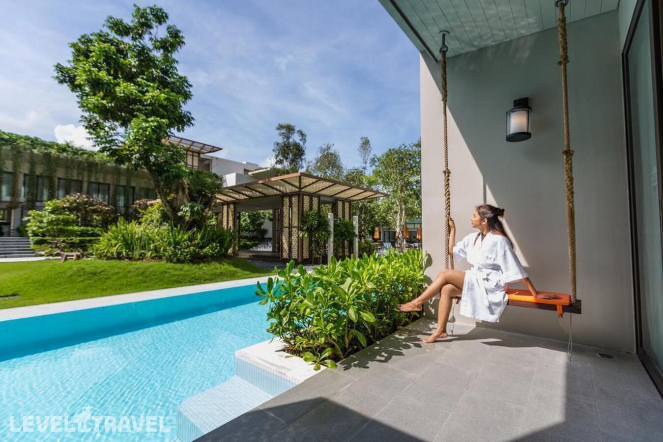 фотографии номера Улучшенный с выходом к бассейну отеля Proud Phuket Hotel в Таиланд(Най Янг Бич) - фото №1