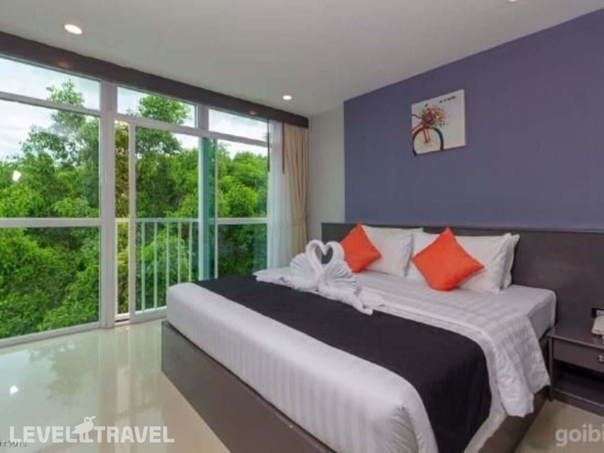 фотографии номера Улучшенный с видом на сад отеля Modern Living Hotel в Таиланд(Патонг Бич) - фото №5
