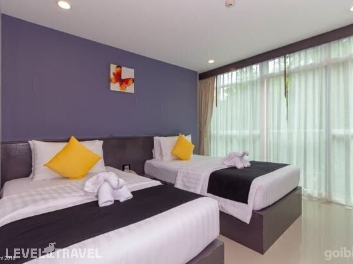 фотографии номера Улучшенный с видом на сад отеля Modern Living Hotel в Таиланд(Патонг Бич) - фото №10
