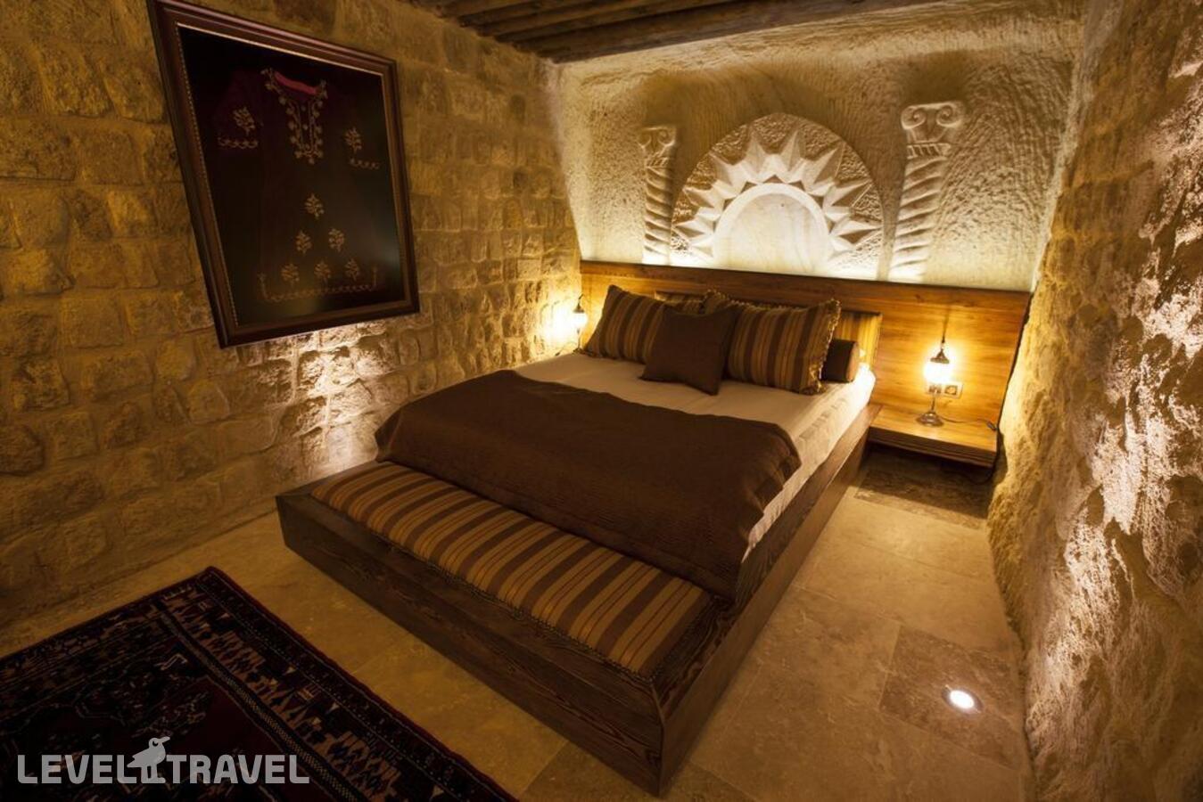 фотографии номера Номер Prime отеля Kayakapi Premium Caves Cappadocia Hotel в Турция(Ургюп) - фото №1