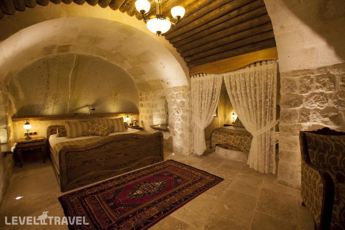 фотографии номера Люкс Majestic Cave отеля Kayakapi Premium Caves Cappadocia Hotel в Турция(Ургюп) - фото №11