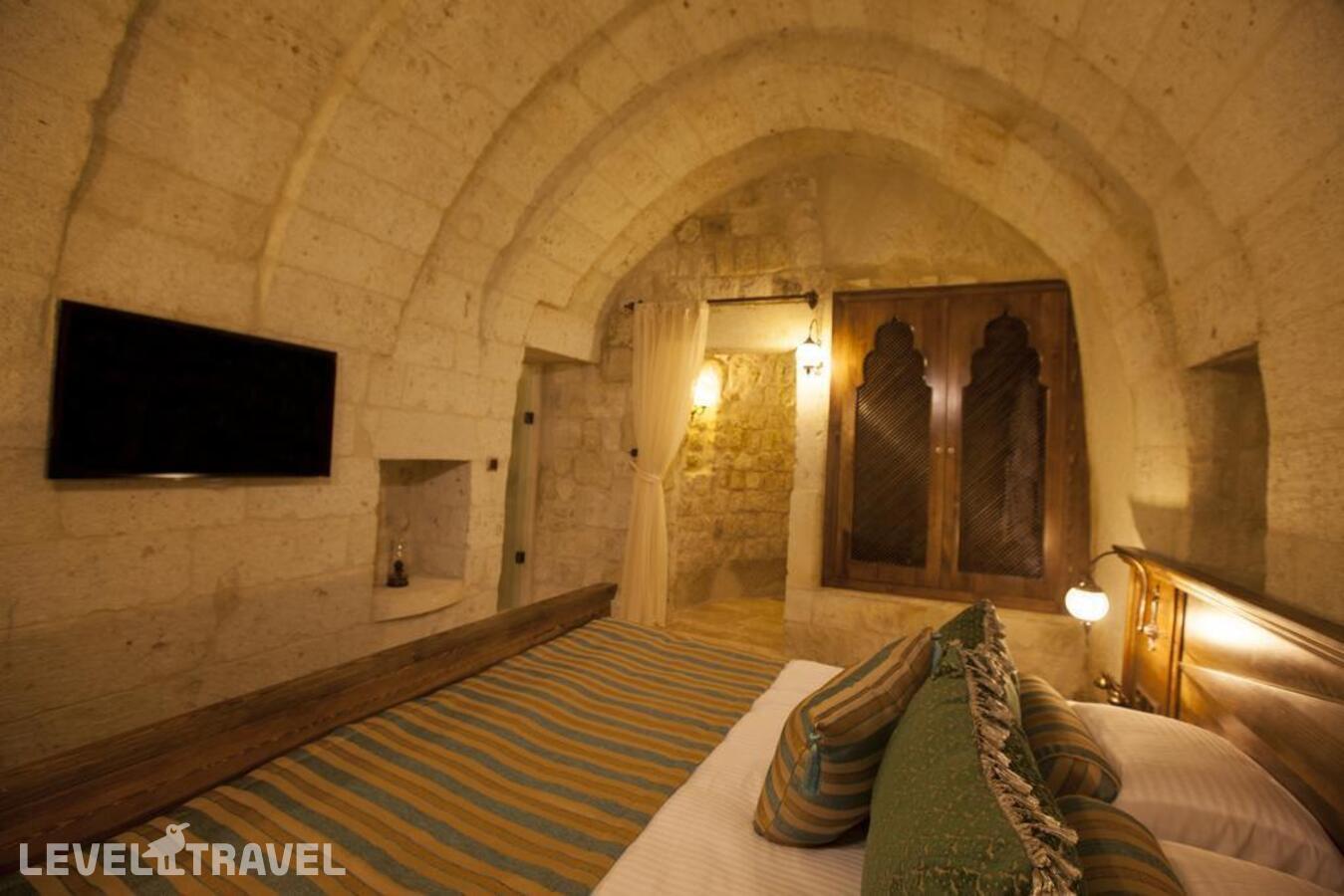 фотографии номера Люкс Glorious Cave отеля Kayakapi Premium Caves Cappadocia Hotel в Турция(Ургюп) - фото №8