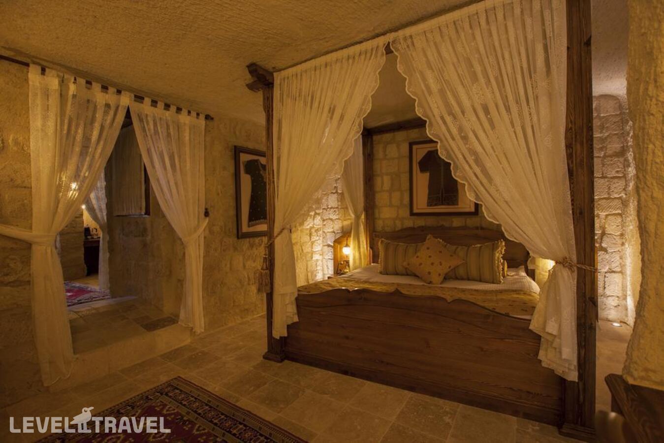 фотографии номера Люкс Glorious Cave отеля Kayakapi Premium Caves Cappadocia Hotel в Турция(Ургюп) - фото №5