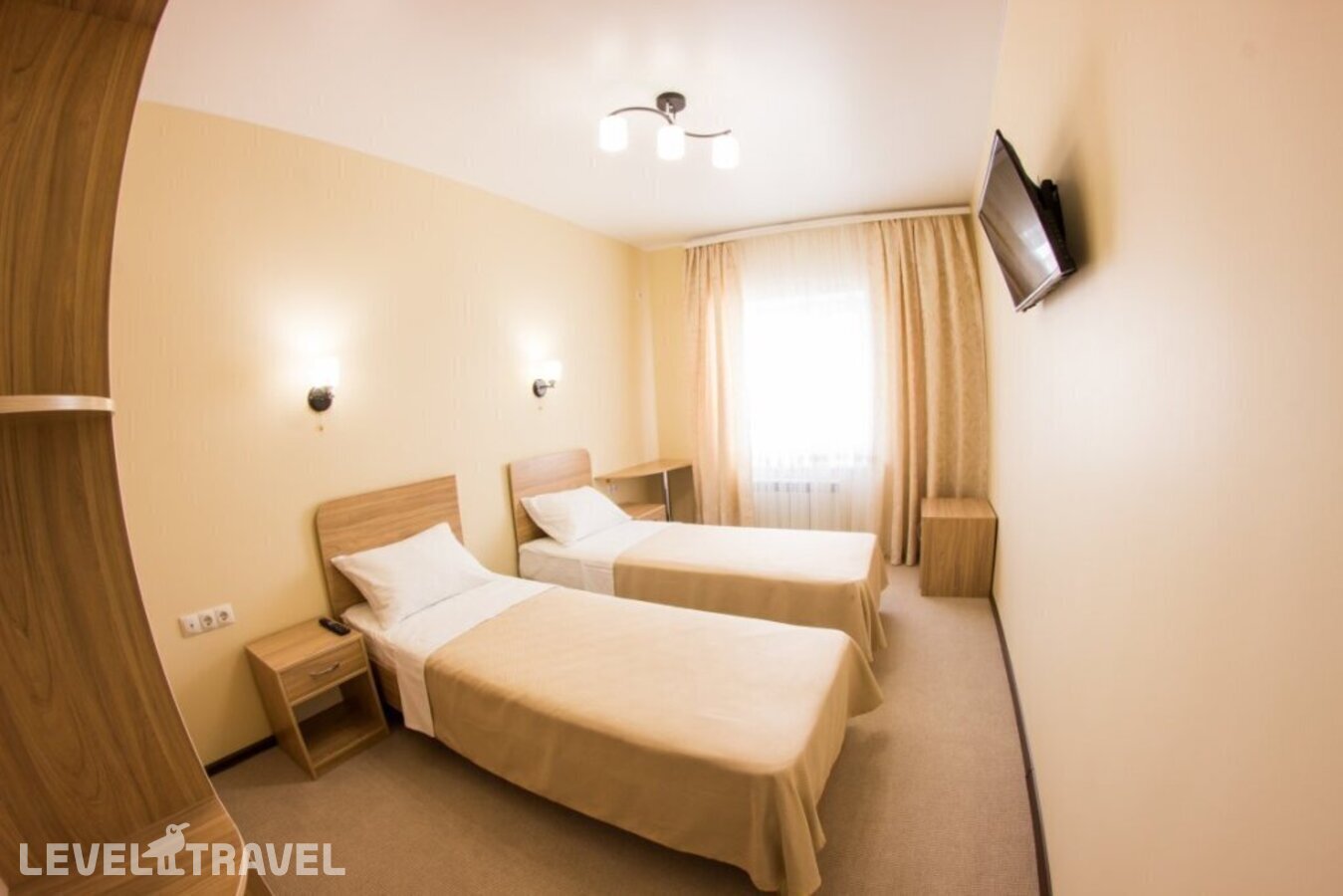 фотографии номера Стандартный (две односпальные кровати) отеля Отель Золотой Шар в Россия(Тольятти) - фото №3