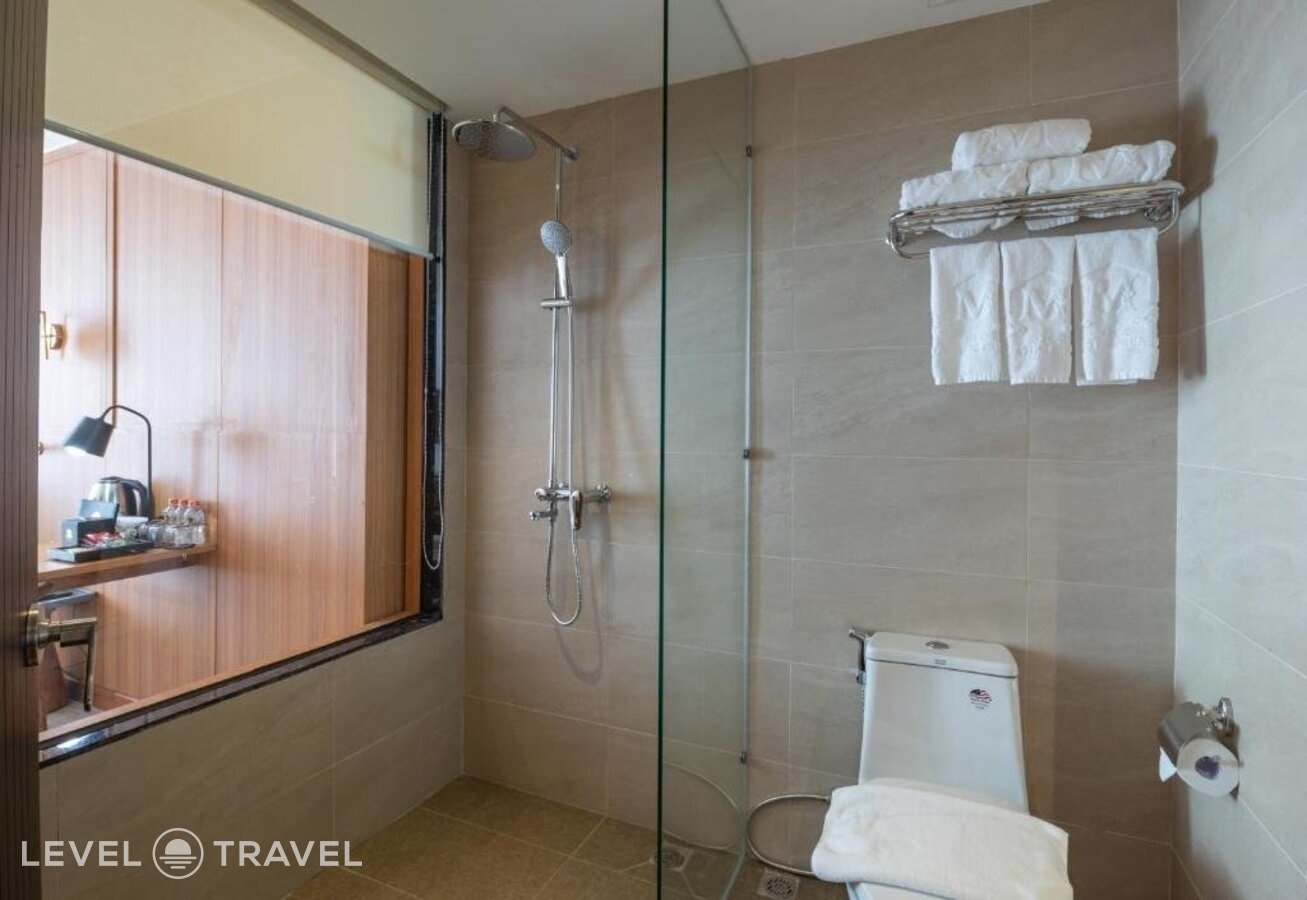 фотографии номера Делюкс с частичным видом на море отеля Majestic Premium Hotel в Вьетнам(Нячанг) - фото №10