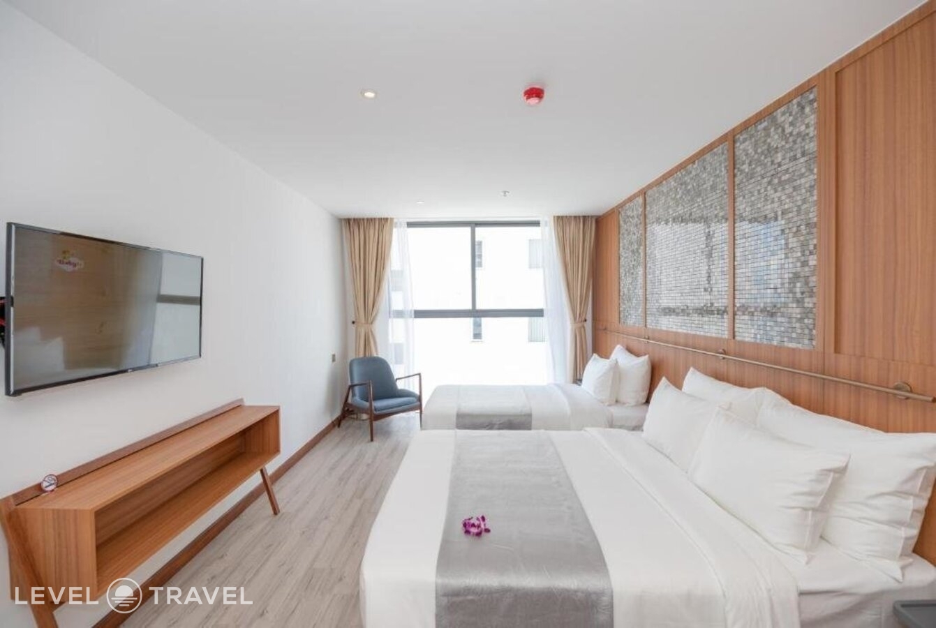 фотографии номера Делюкс с частичным видом на море отеля Majestic Premium Hotel в Вьетнам(Нячанг) - фото №11