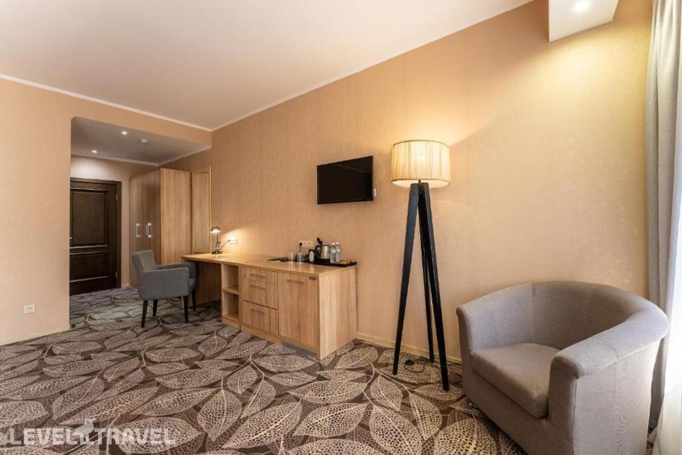 фотографии номера Делюкс (две односпальные кровати) отеля Renion Park Hotel в Казахстан(Алматы) - фото №2
