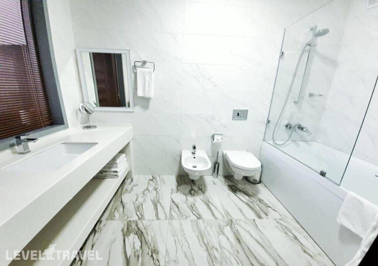 фотографии номера Стандартный (две односпальные кровати) отеля ONE Hotel Astana в Казахстан(Астана) - фото №4