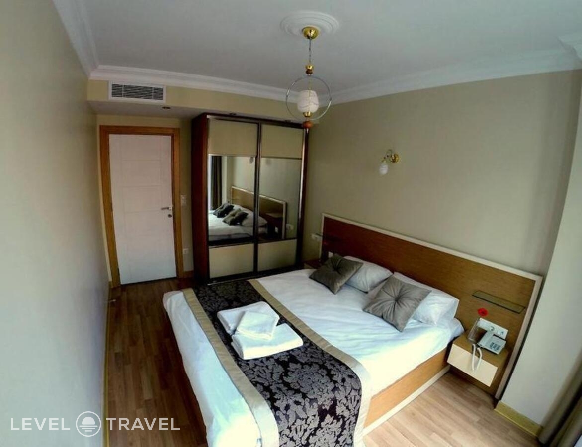 фотографии номера Стандартный (две односпальные кровати) отеля Homelike Residence в Турция(Шишли) - фото №2