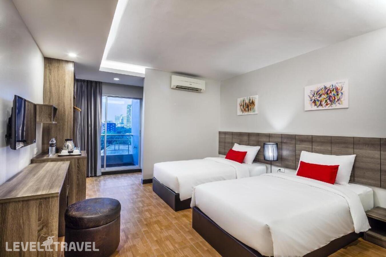 фотографии номера Делюкс (две односпальные кровати) отеля Livotel Hotel Hua Mak Bangkok в Таиланд(Бангкок) - фото №1