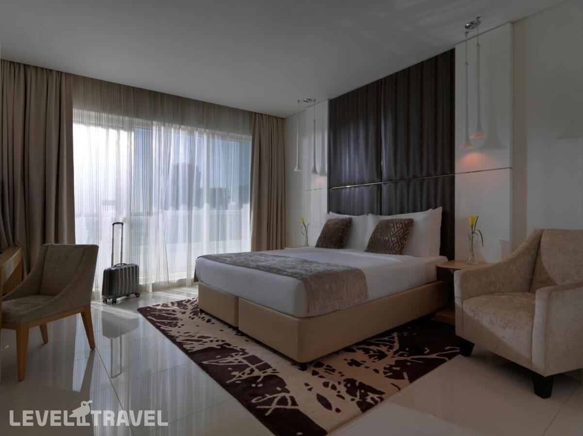 фотографии номера Делюкс с видом на город отеля Damac Maison Canal Views Hotel в ОАЭ(Бизнес Бей) - фото №4