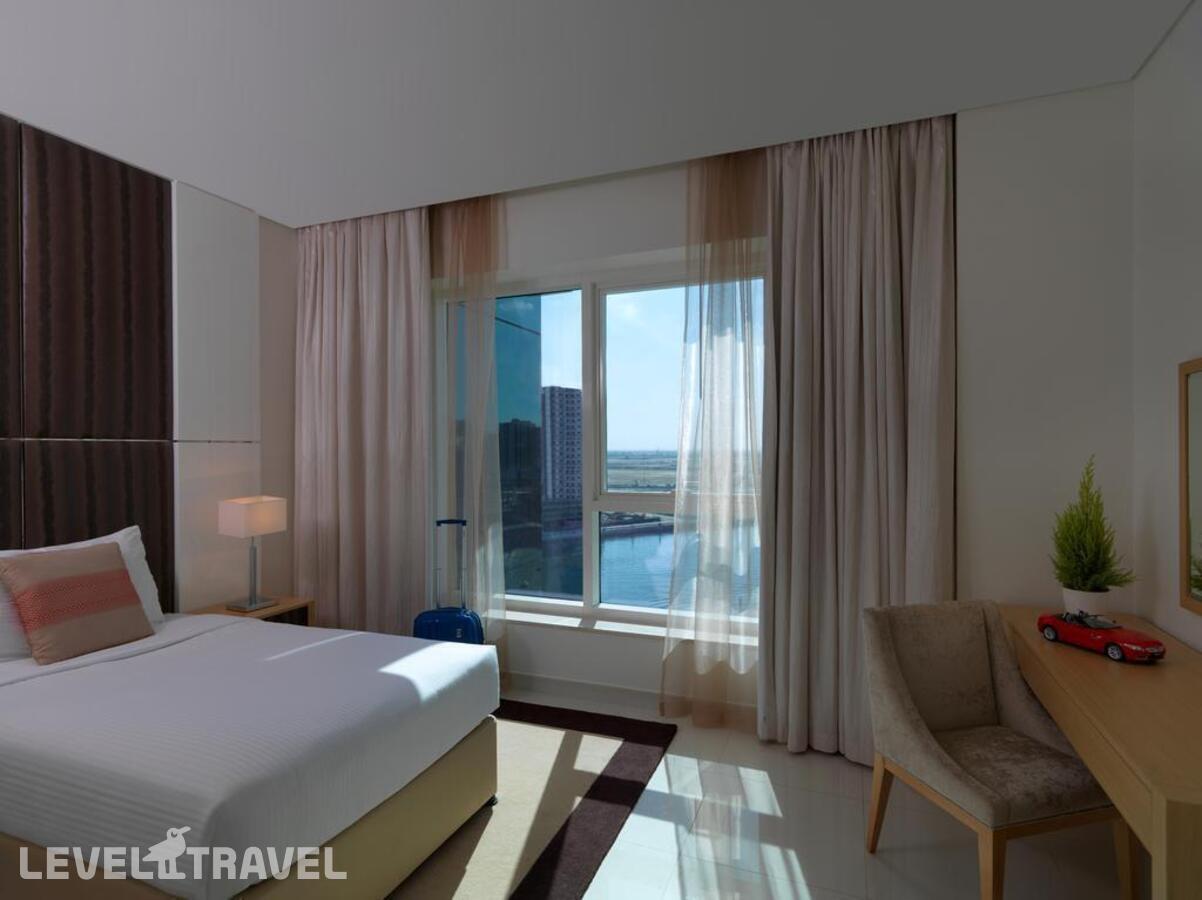 фотографии номера Делюкс отеля Damac Maison Canal Views Hotel в ОАЭ(Бизнес Бей) - фото №2