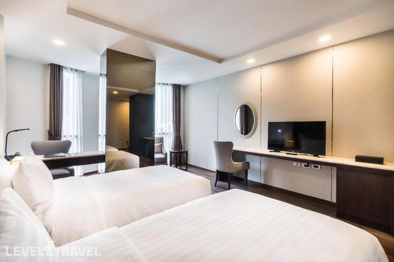 фотографии номера Улучшенный (две односпальные кровати) отеля SureStay Plus Hotel by Best Western Sukhumvit 2 в Таиланд(Бангкок) - фото №1