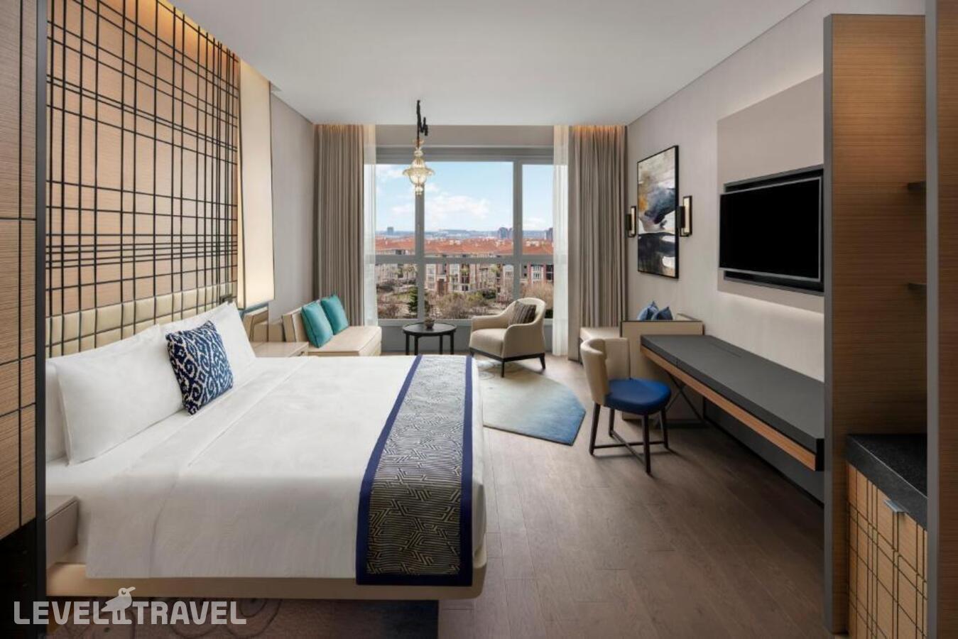 фотографии номера Делюкс с видом на город отеля JW Marriott Hotel Istanbul Marmara Sea в Турция(Бакыркёй) - фото №1