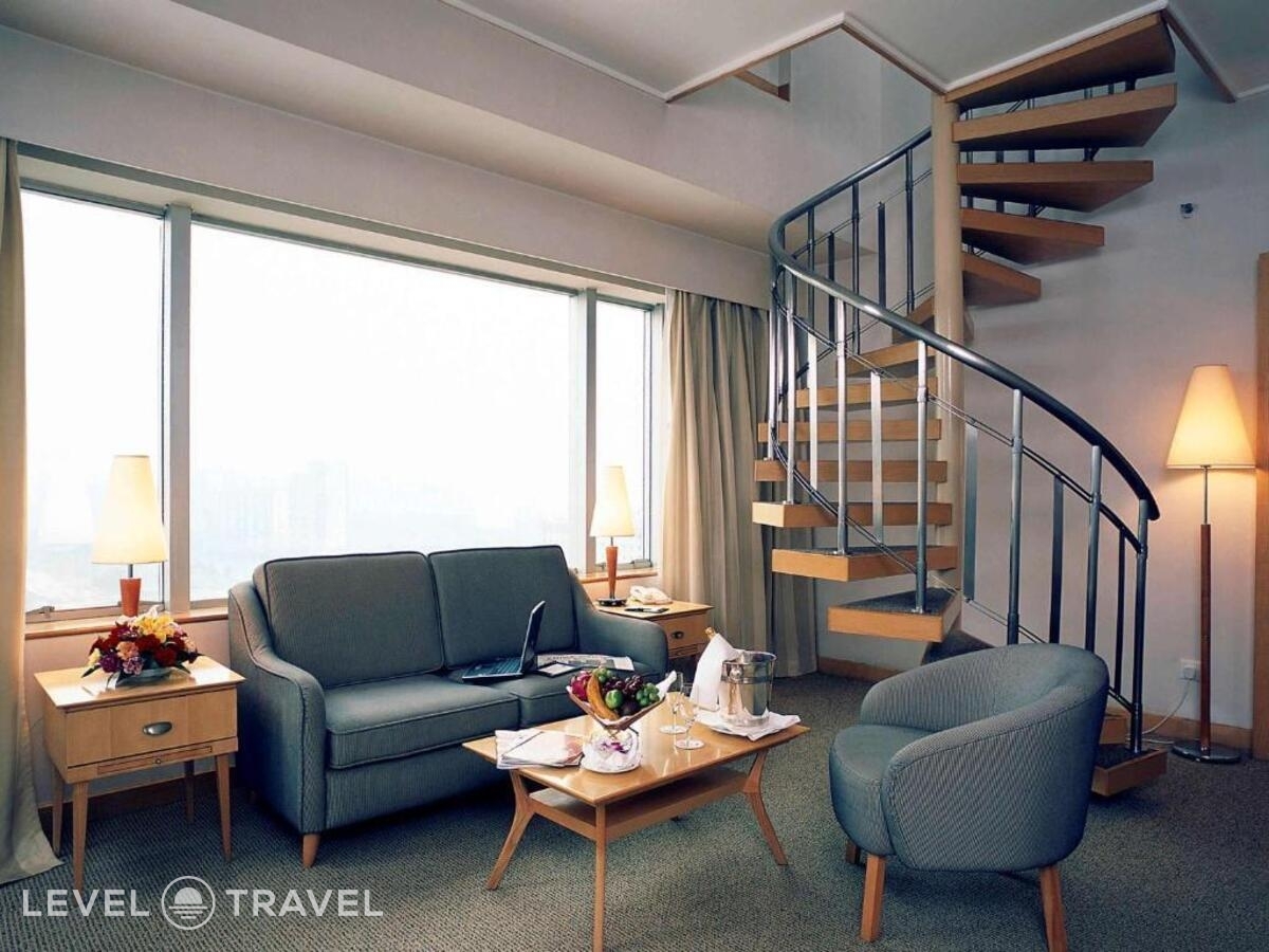 фотографии номера Люкс двухуровневый отеля Beijing Xinqiao Hotel в Китай(Пекин) - фото №1