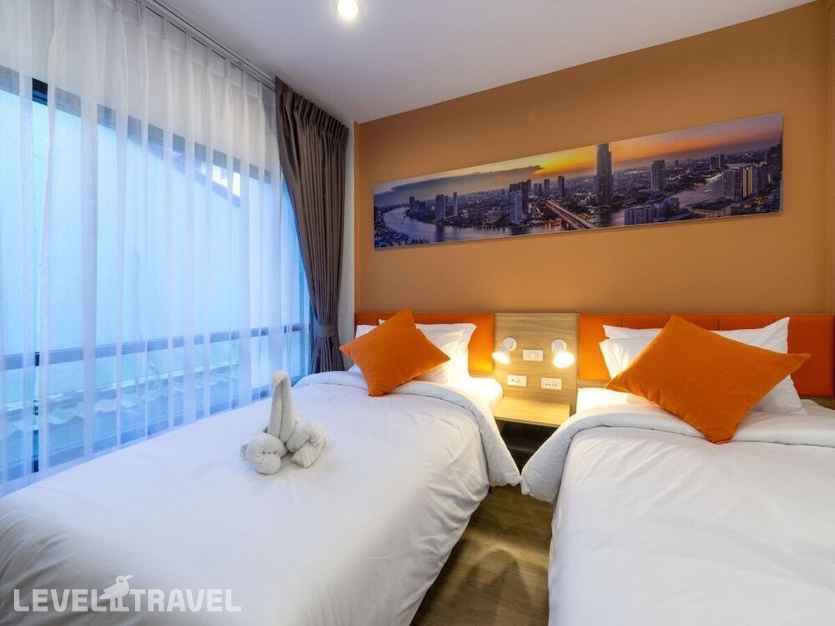 фотографии номера Стандартный (две односпальные кровати) отеля 7 Days Premium Hotel Don Mueang Airport в Таиланд(Бангкок) - фото №1