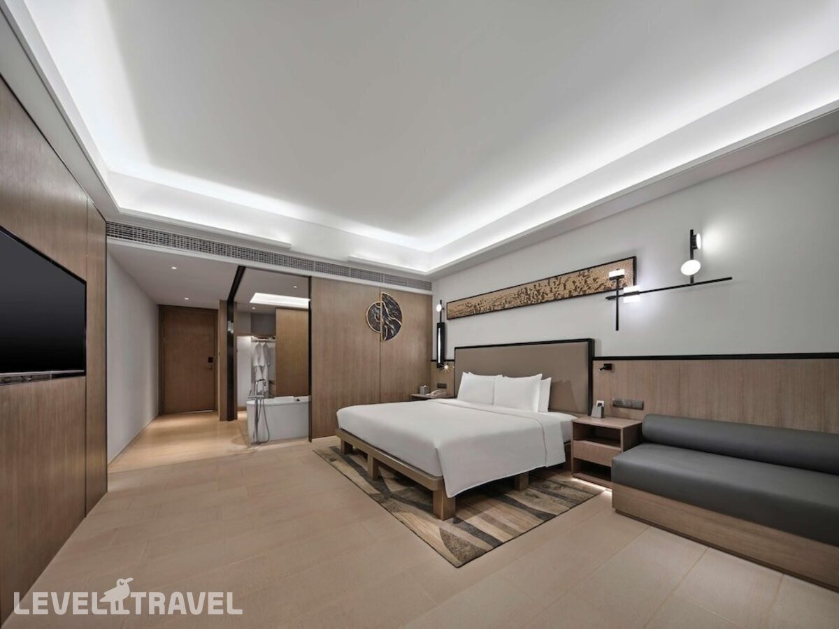 фотографии номера Премьер с видом на сад отеля Wanda Realm Resort Sanya Haitang Bay в Китай(Хайтанг Бэй) - фото №3