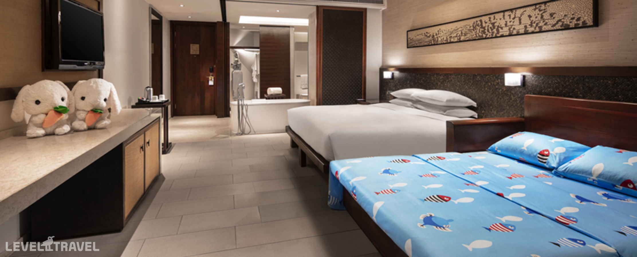 фотографии номера Семейный номер отеля Wanda Realm Resort Sanya Haitang Bay в Китай(Хайтанг Бэй) - фото №1