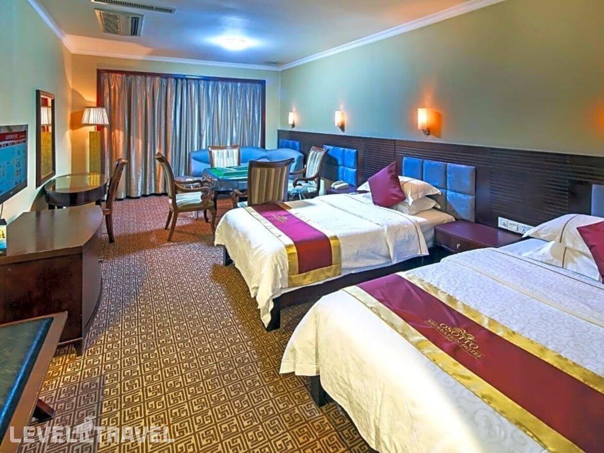 фотографии номера Делюкс (две односпальные кровати) отеля Guangdong Osotto Recreation Hotel в Китай(Гуанчжоу) - фото №4