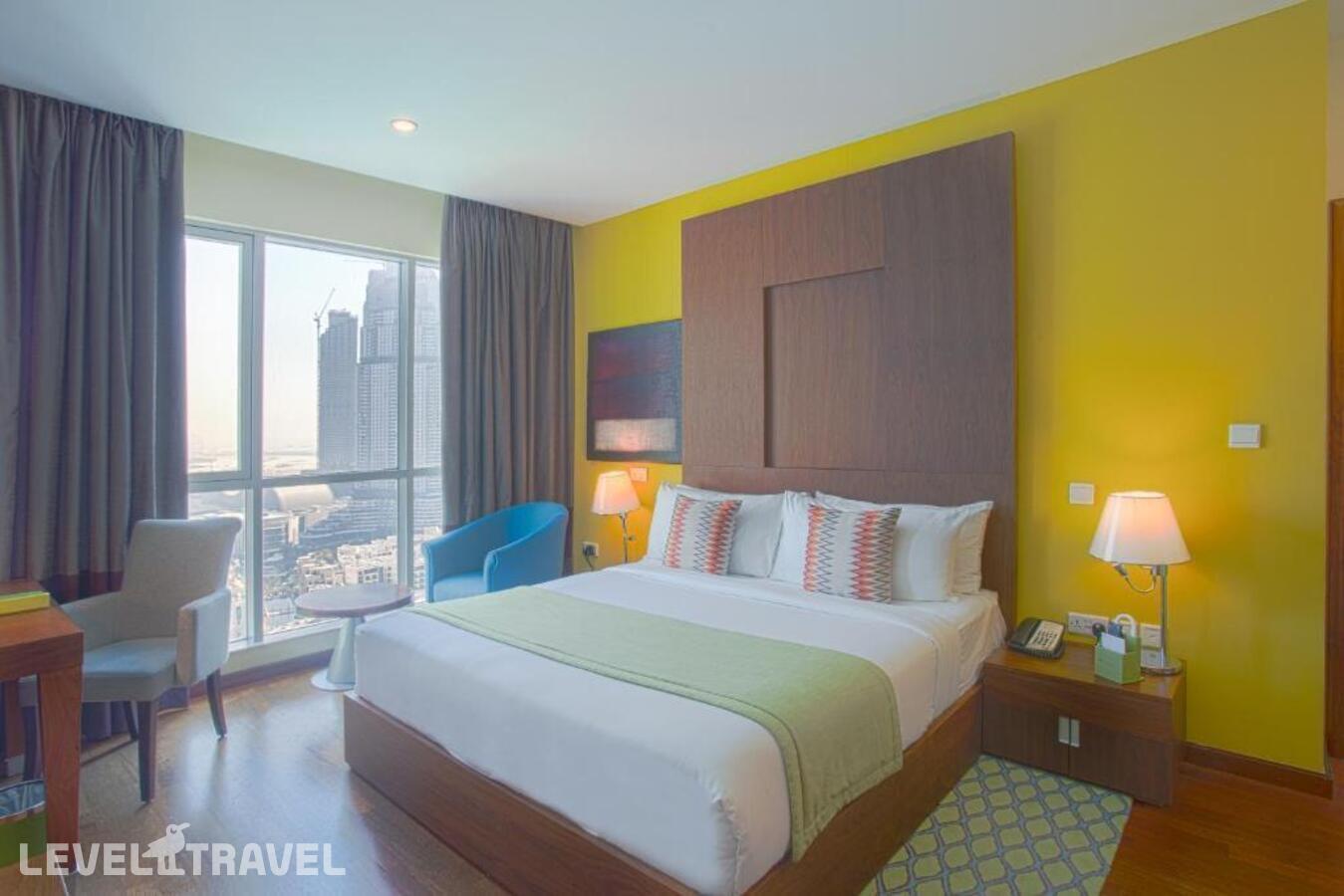 фотографии номера Люкс с видом на фонтан (1 спальня) отеля Ramada Downtown Dubai в ОАЭ(Даунтаун Дубай) - фото №2
