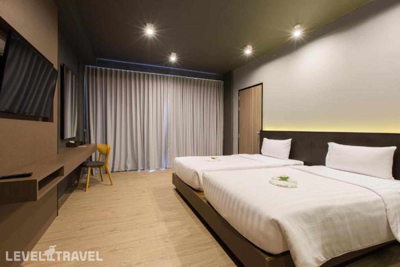 фотографии номера Делюкс (две односпальные кровати) отеля Maya Phuket Airport Hotel в Таиланд(Най Янг Бич) - фото №1